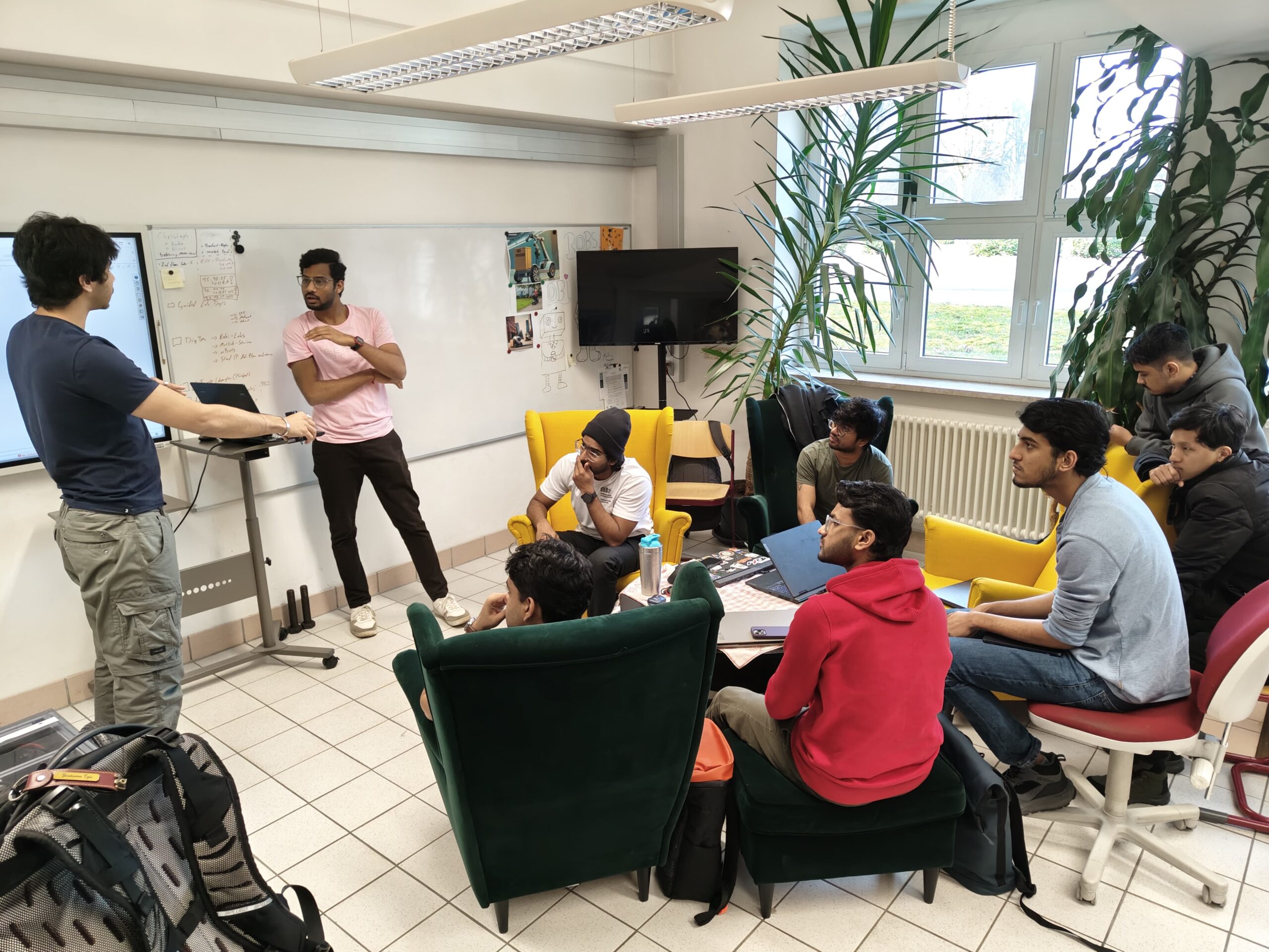HSM Aries engineering team brainstorming in the robotics lab