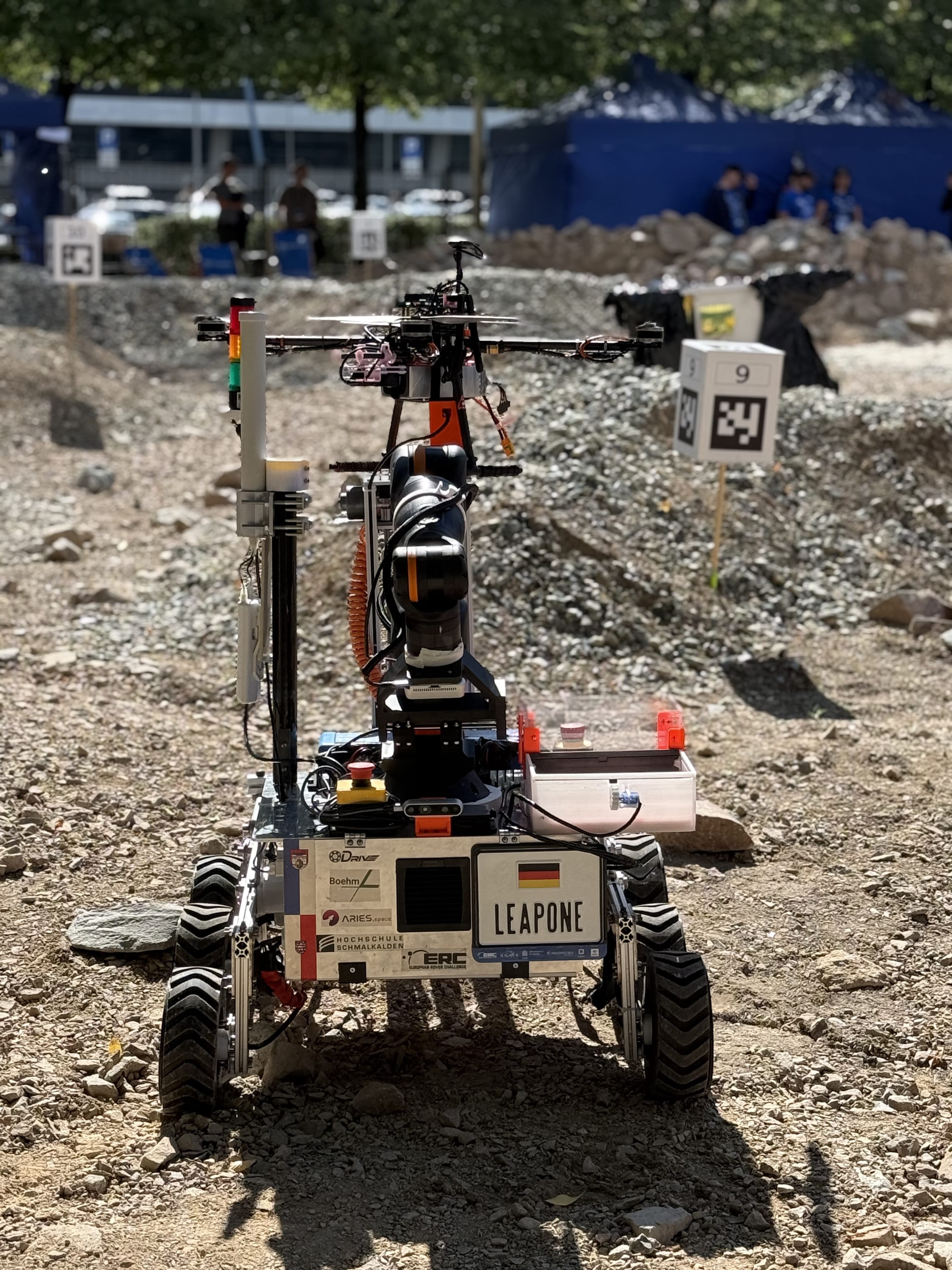 LEAP-One carries the quadcopter on its top deck beside marker 9.