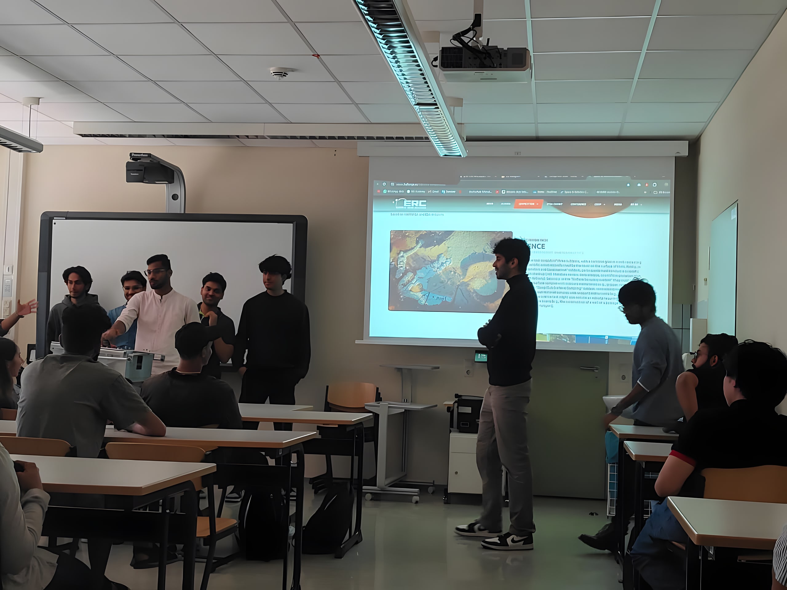 A member presents the rover programme to new members in the seminar room.