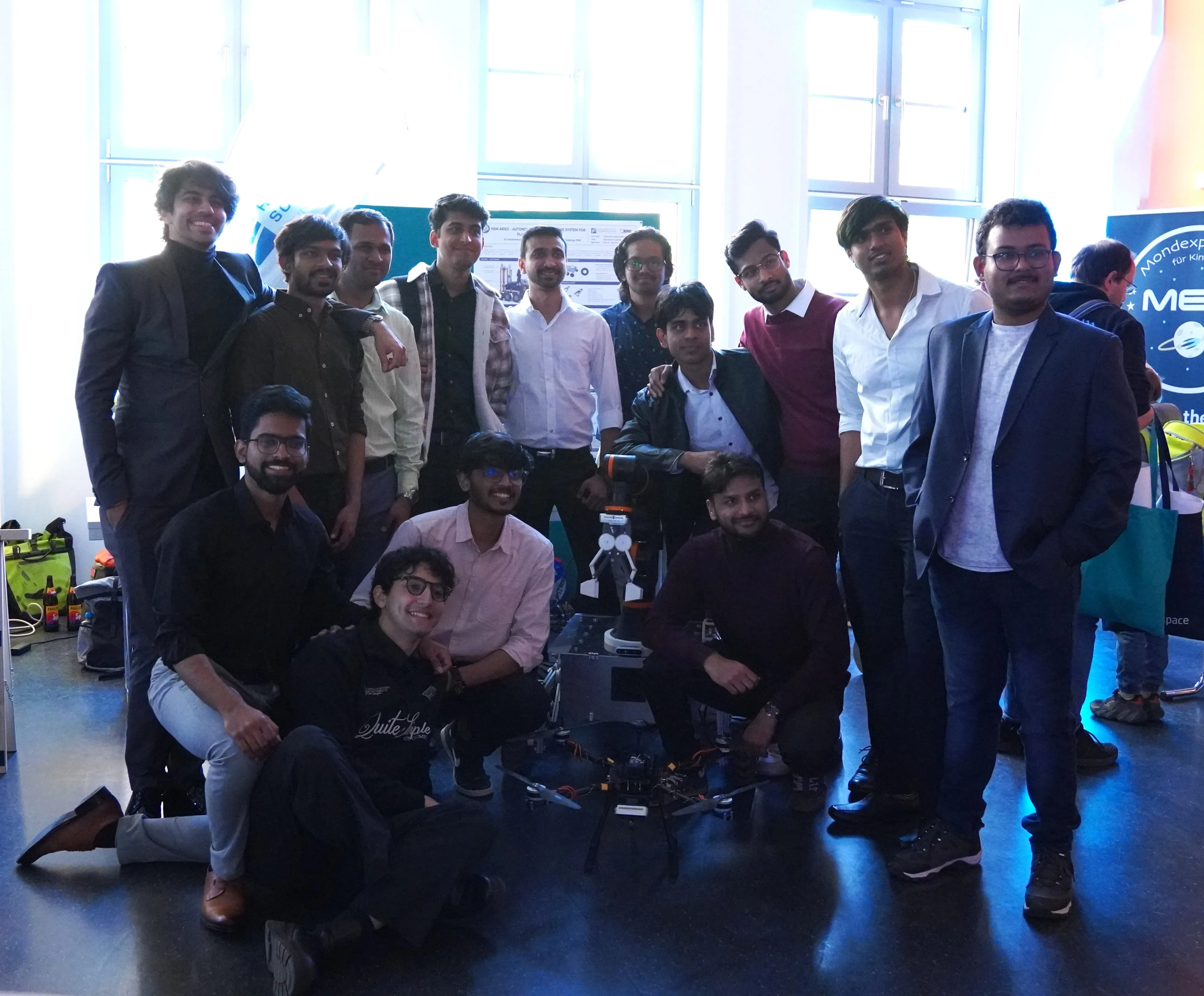 The team gathers around LEAP-One on the HSM Aries stand at Space Night 2026.